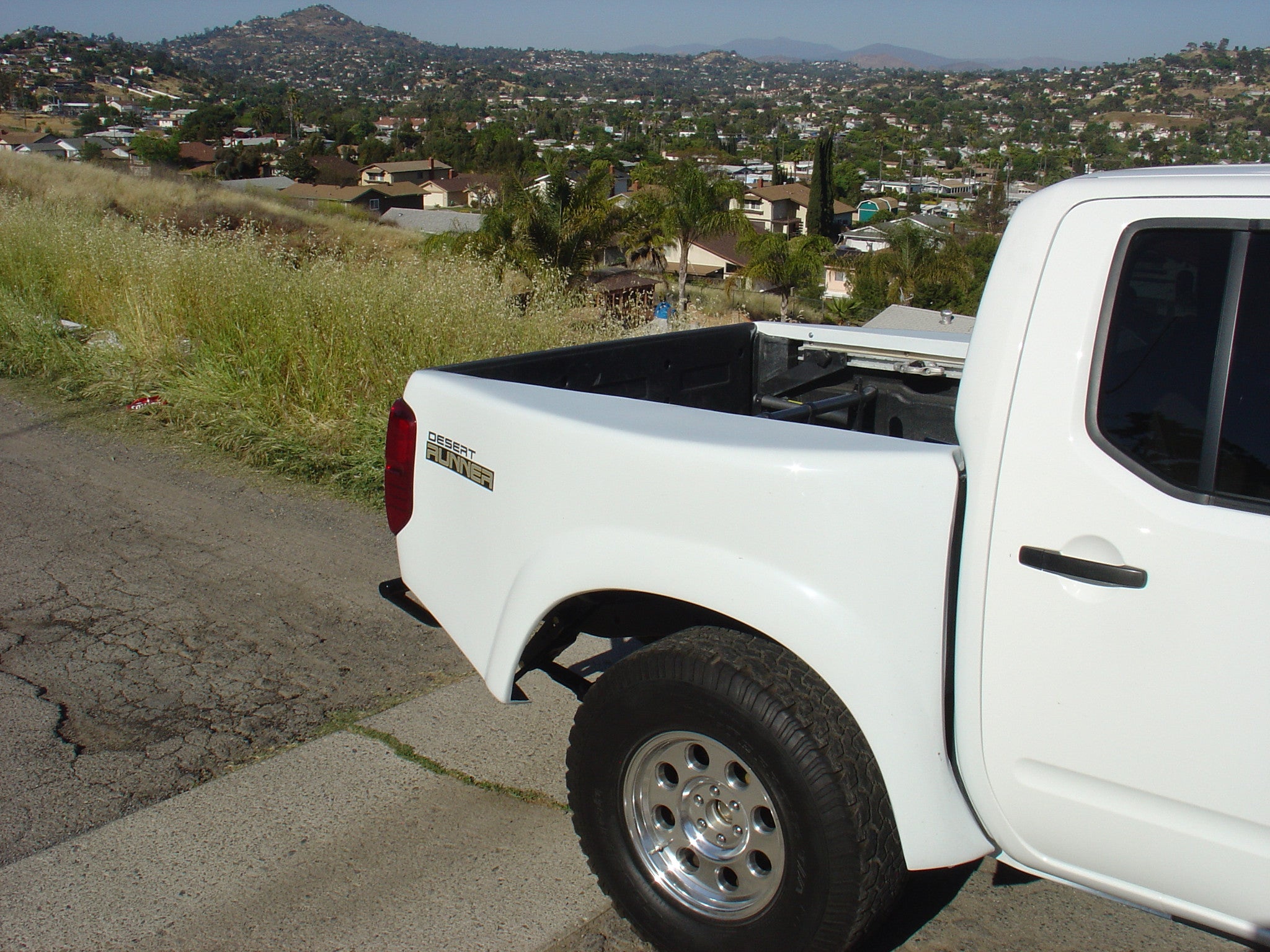 05-15 Nissan Frontier 4" Bulge Crew Cab Off Road Fiberglass Bedsides - McNeil Racing Inc